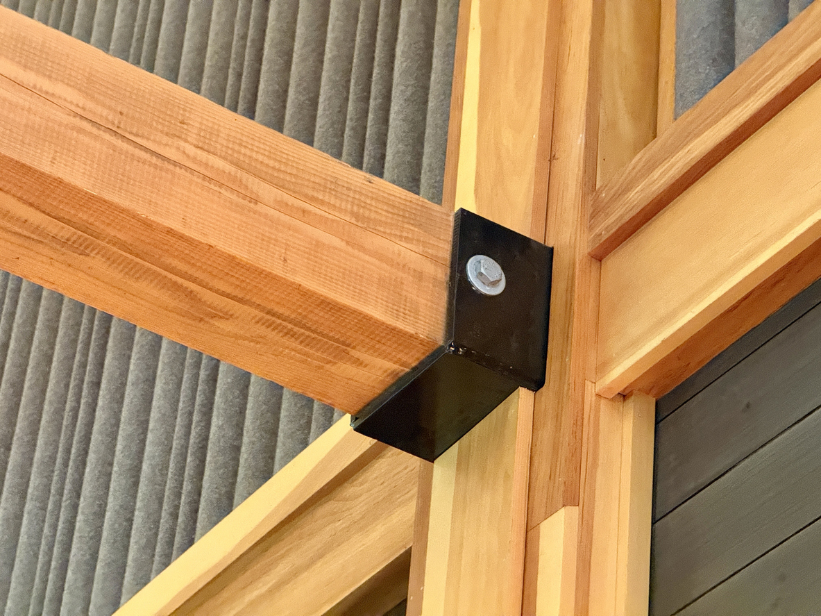Warm wooden ceiling structure showcasing beams and architectural design