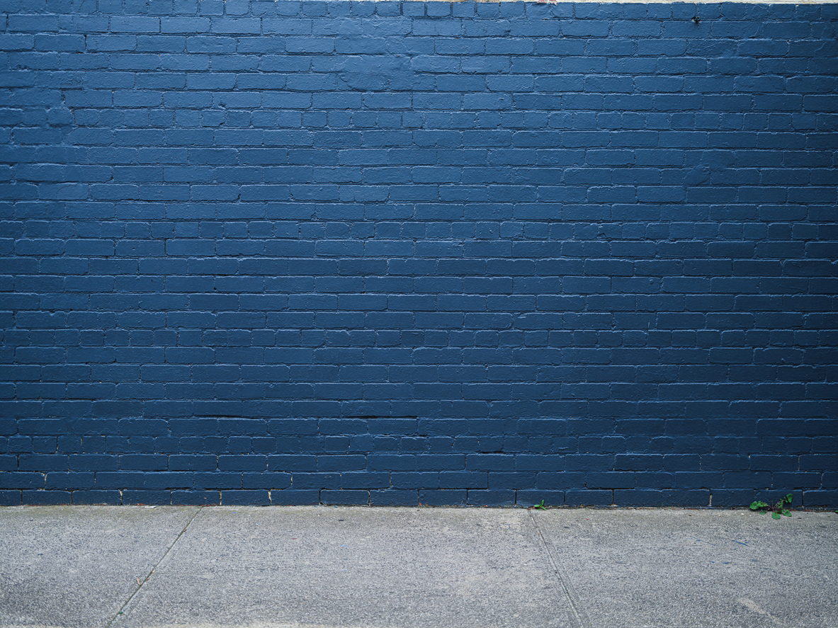 Dark grunge blue brick wall