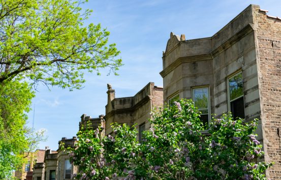 The Tops of a Row of Similar Old Homes in Logan Square Chicago